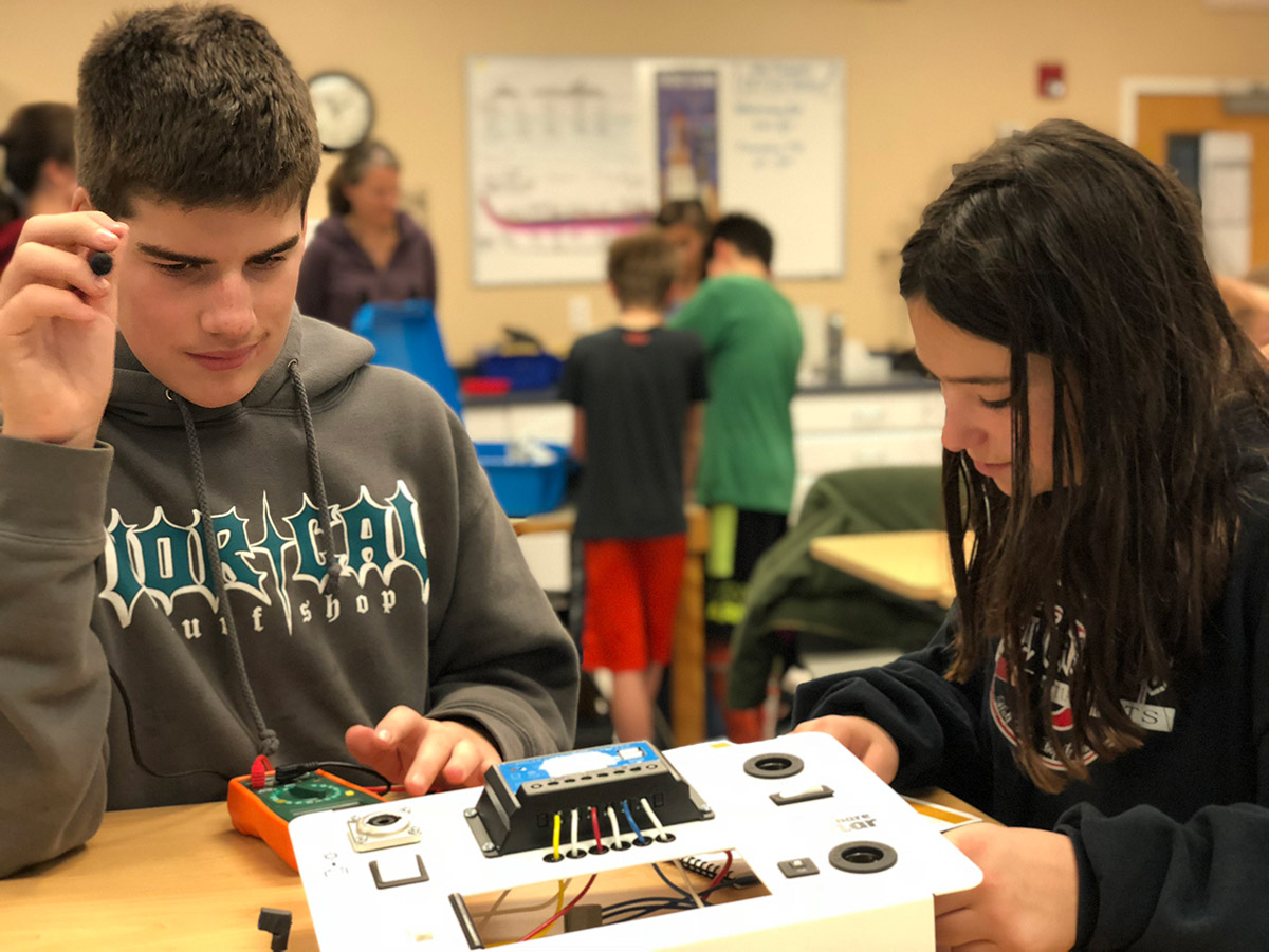 Sea Crest sixth graders at work on their Solar Suitcase project