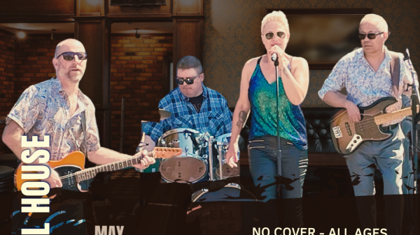 Four musicians performing indoors: a guitarist on the left wearing sunglasses and a patterned shirt, a drummer in the center with sunglasses and a blue plaid shirt, a female vocalist in the center-right with short blonde hair, sunglasses, and a blue-green sleeveless top, and a bassist on the right wearing sunglasses and a patterned shirt. Text includes "American Legion Post 474 Half Moon Bay, CA," "Wheel House," "May 22 Fri 8-10:30PM," "No Cover - All Ages," "Vintage Rock Vibes," and "wheelhousesongs.com." The setting has warm lighting with wood and brick interior elements.