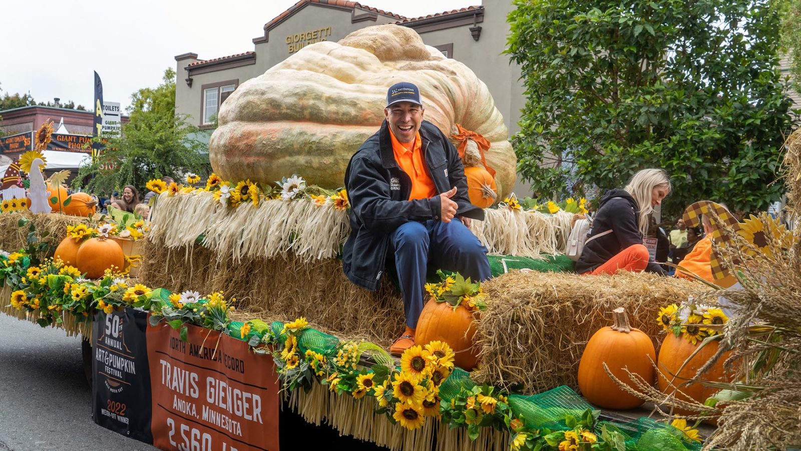 activities-parade-weigh-off-champ-travis-gienger-on-float-2022-300dpi
