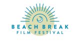 Logo for the Beach Break Film Festival featuring a stylized blue crescent wave inside a semicircle with radiating blue lines above a pale yellow circle background. The text "BEACH BREAK" is in bold blue uppercase letters, with "FILM FESTIVAL" in smaller blue uppercase letters below.